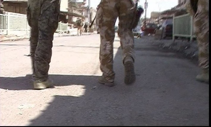 A simple sequence: shot 1, soldiers feet walking from behind